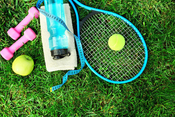 sports equipment on grass - Foto, Imagen