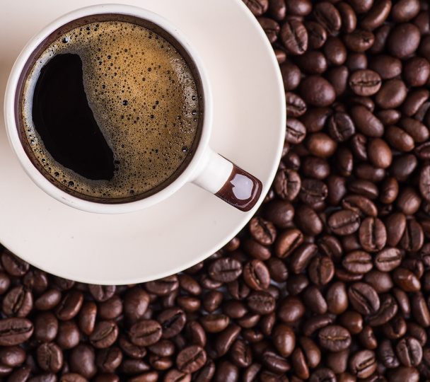 Koffiecup en koffiebonen - Foto, afbeelding