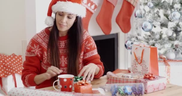 woman making Christmas greeting call - Video, Çekim