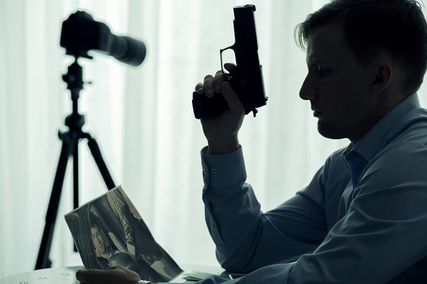Serial killer with gun - Fotó, kép