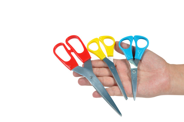 Many scissors in mans hand - Photo, Image