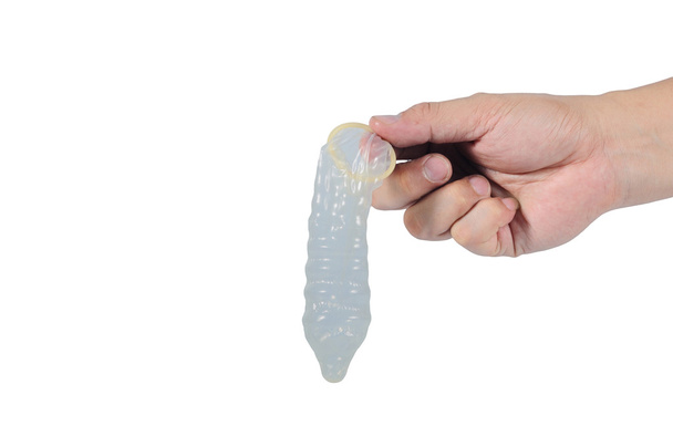 Homme main asiatique tenant préservatif
 - Photo, image