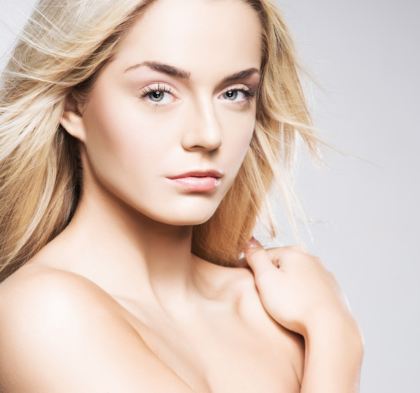 Portrait of a young blond woman in makeup - Photo, Image