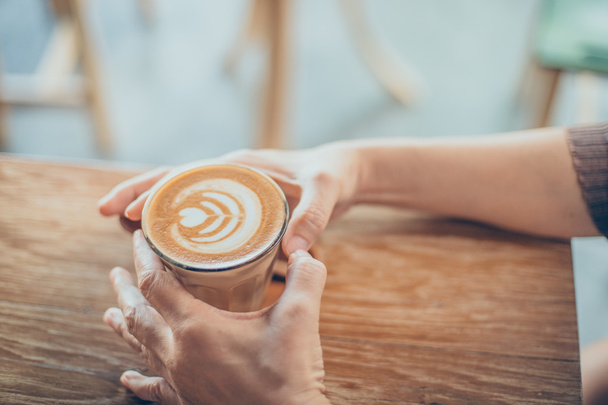 woman hand with cup of coffee - Photo, Image