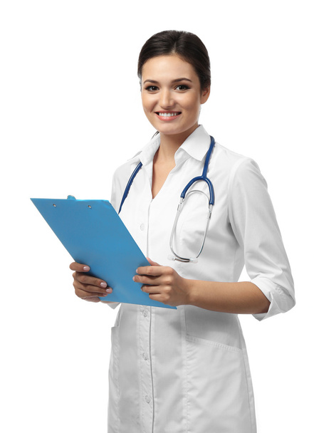 Smiling medical doctor holding a folder - Foto, imagen