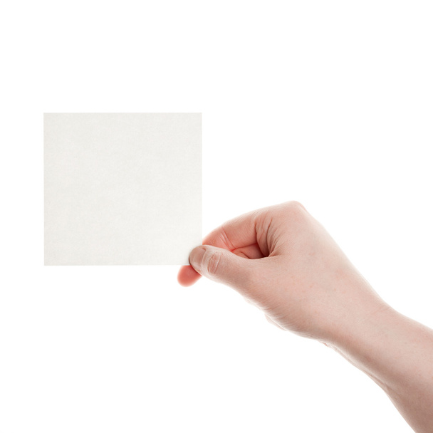 Paper card in woman hand - Фото, изображение