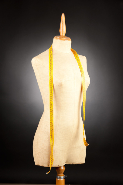 Tailor mannequin with tape measure - Fotoğraf, Görsel