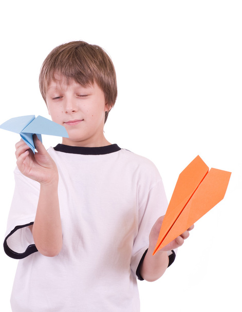 Little beautiful boy with paper airplanes - Foto, afbeelding
