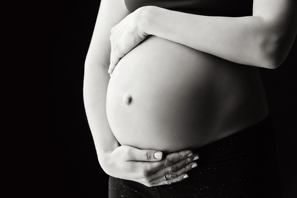 妊娠中の腹のクローズ アップ - 写真・画像