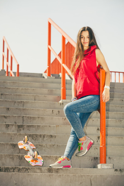 Urban skate girl with skateboard. - Фото, зображення