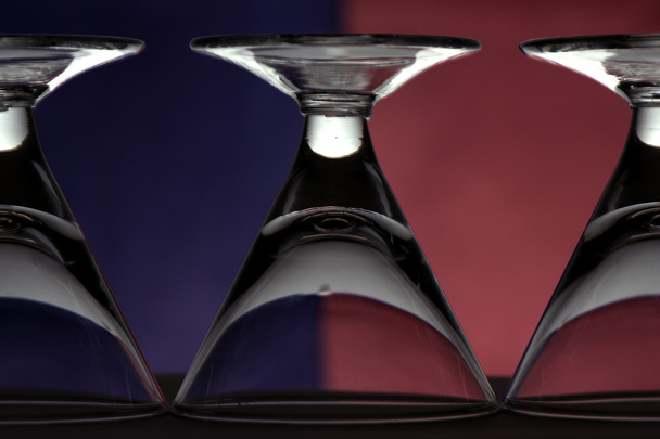Glass goblets on a colored background - Foto, Imagem