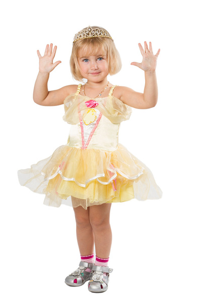  Little girl in a beautiful yellow dress and crown on white back - Fotografie, Obrázek