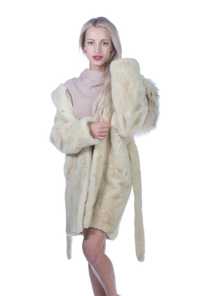 Young Woman Fashion Model dressed in white fur coat - Photo, Image