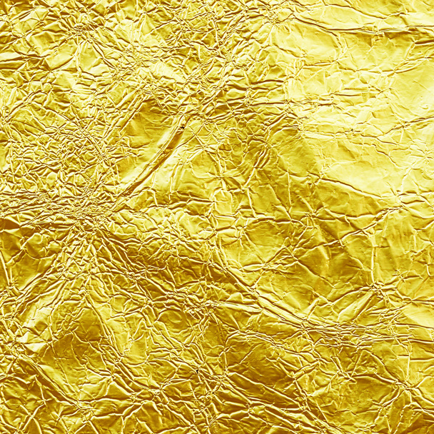 Fényes sárga levél arany fólia textúra a háttér. - Fotó, kép