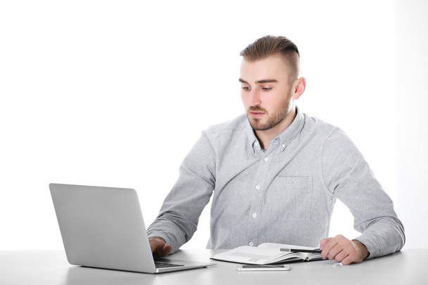 Businessman working with laptop - 写真・画像