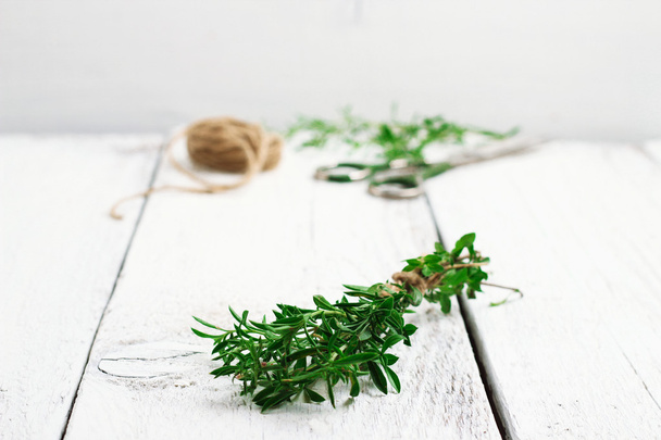 Fresh herbs (savory) on a wooden table - Foto, Imagem