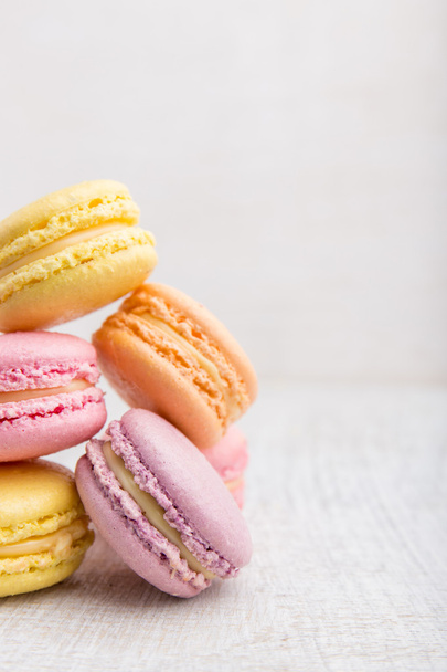 Colorful macarons on vintage pastel background - Zdjęcie, obraz