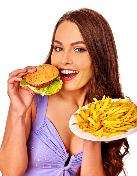 Красивая женщина ест гамбургер
 - Фото, изображение