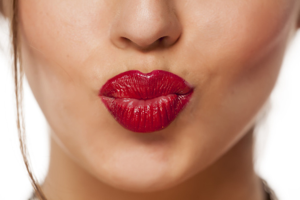 pursed mouth with red lipstick - Fotografie, Obrázek