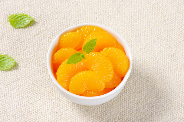 Naranjas de mandarín enlatadas
 - Foto, Imagen