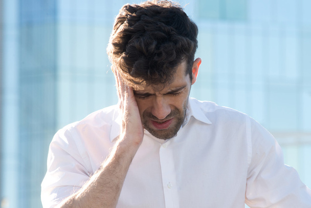 Man having a headache - Photo, Image