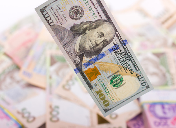 Ukrainan hryvnia ja Yhdysvaltain dollari
. - Valokuva, kuva