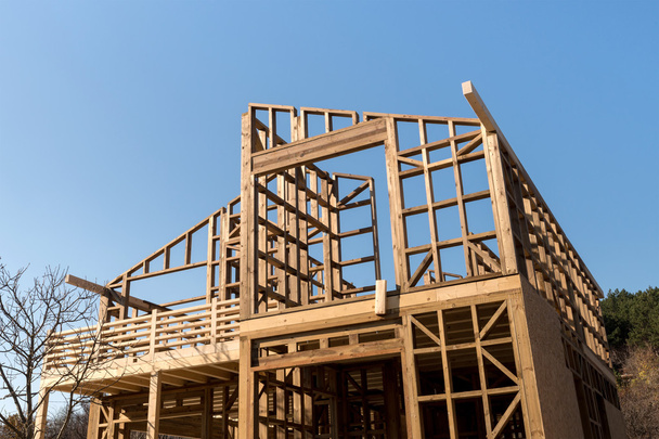 Quadro de madeira de uma nova casa em construção
 - Foto, Imagem