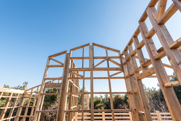 Wooden frame of a new house under construction - Photo, Image