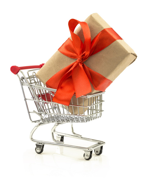Gift with red bow in the shopping cart - Foto, Imagem