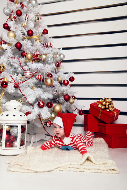 Cute Santa baby and big presents - Foto, imagen