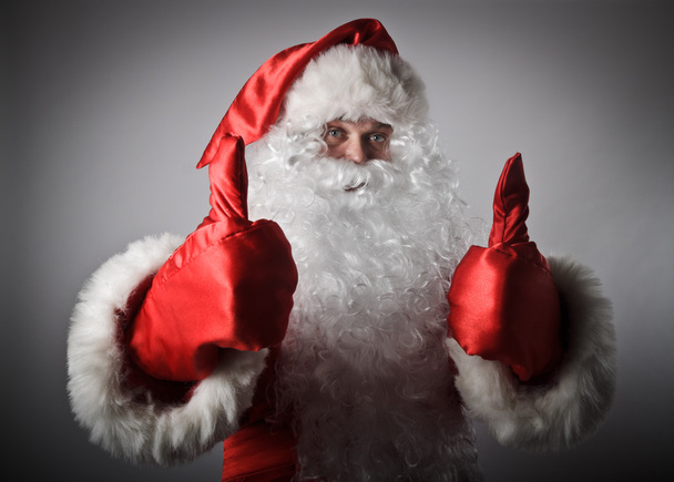 Santa Claus mutatja thumbs up.  - Fotó, kép