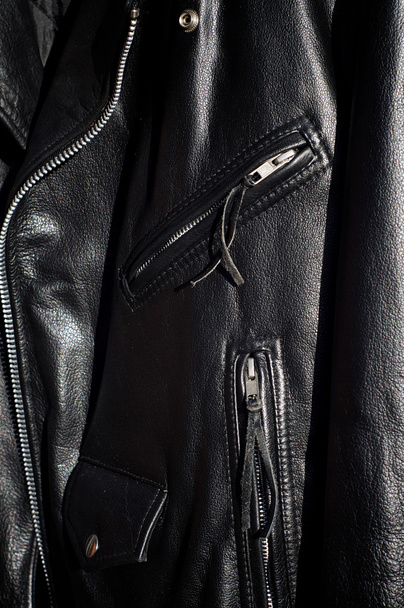 close up of traditional black classic leather motorcycle jacket - 写真・画像