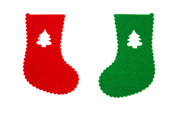 hand made red and green christmas sock with christmas tree cut out on white - Photo, Image