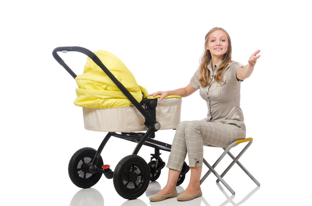 Vrouw met de kinderwagen geïsoleerd op wit - Foto, afbeelding