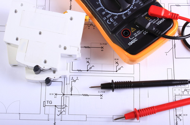 Multimeter and electric fuse on construction drawing - Photo, Image