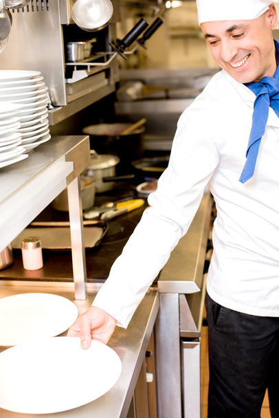 chef in hotel kitchen - Foto, Bild