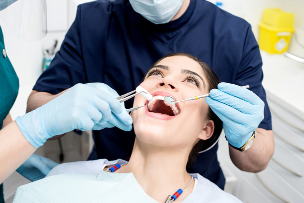 Patient getting her dental check up - Valokuva, kuva