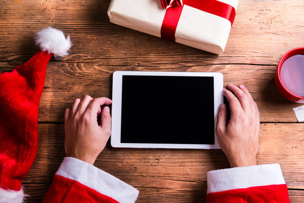 Santa Claus with digital tablet - Фото, изображение