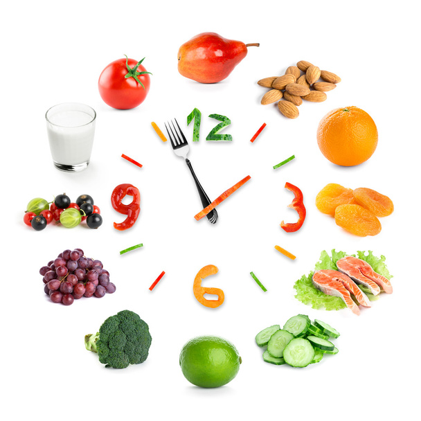 Food clock with healthy food - 写真・画像