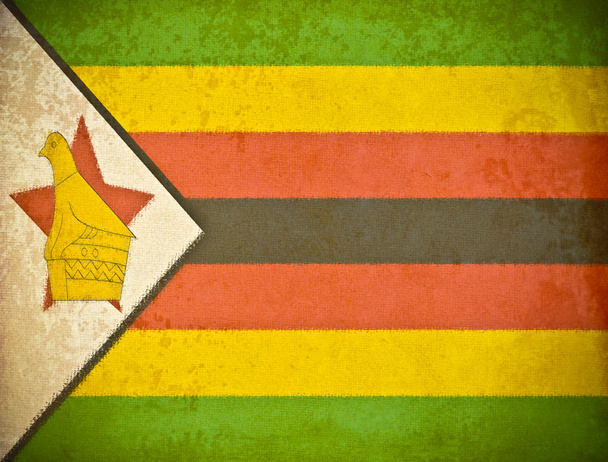oud grunge papier met zimbabwe vlag achtergrond - Foto, afbeelding