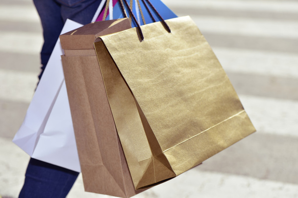 young man carrying some shopping bags - Foto, imagen