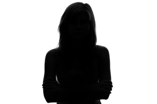 silhouette of a pensive woman on a white background - Foto, imagen