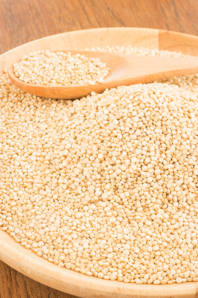 Quinoa grain in wooden plate - Foto, Imagem