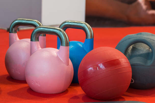 pink and blue rubber kettlebell and medicine ball - Photo, Image