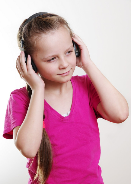 schoolgirl with earphones - Fotó, kép