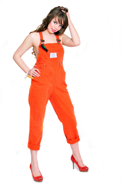 Contractor girl with hummer and screwdrive - Φωτογραφία, εικόνα