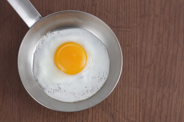 fried eggs on metal pan - Fotografie, Obrázek