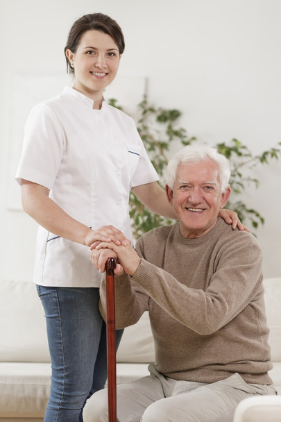 Young nurse and old man - Photo, Image