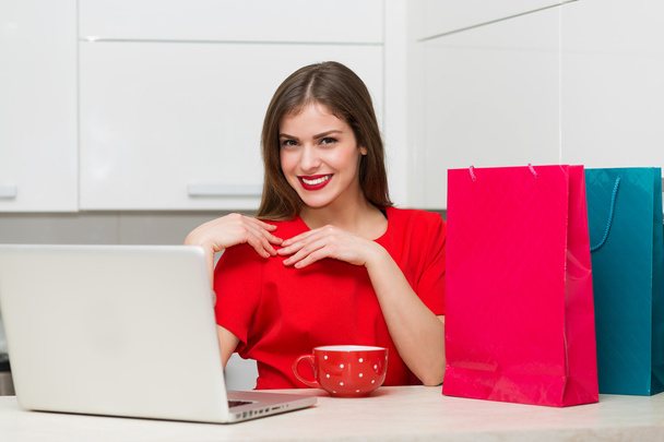 Glamorous housewife shopping online - Photo, Image