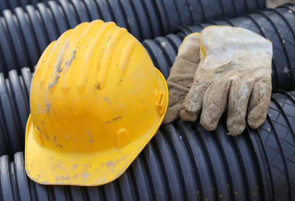 Sarı Sabit hat ve inşaat alanında iş eldivenleri - Fotoğraf, Görsel